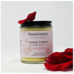 Rose essential Oil candle in a glass jar.