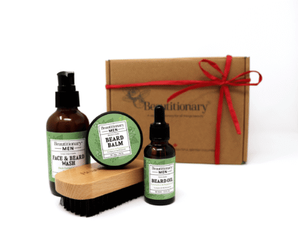 A Beard Set containing a face and beard wash, oil, balm, and brush.