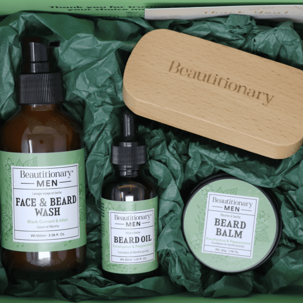 A Beard Set containing a face and beard wash, oil, balm, and brush.