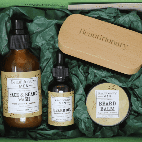 A Beard Set containing a face and beard wash, oil, balm, and brush.