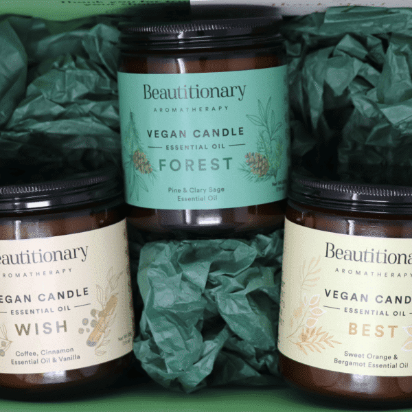 Three soy based candles scented with essential oils in a gift box.