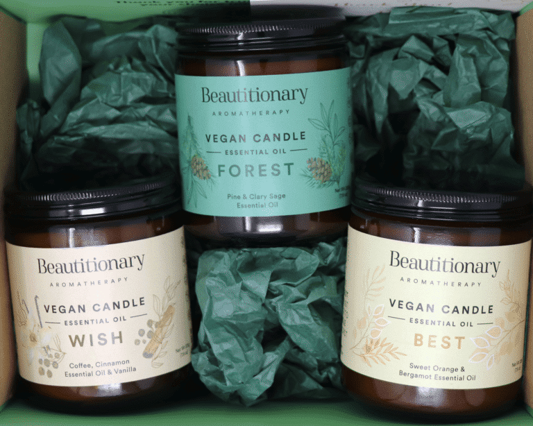 Three soy based candles scented with essential oils in a gift box.
