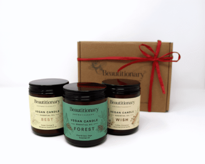 Three soy based candles scented with essential oils in a gift box.
