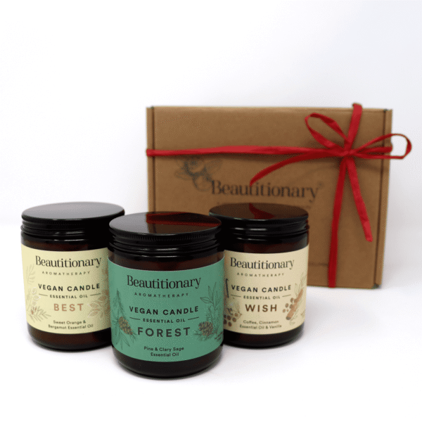 Three soy based candles scented with essential oils in a gift box.