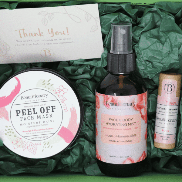 A Mask Set gift box containing a peel off face mask, hydrating face and body mist, and vegan lip balm.