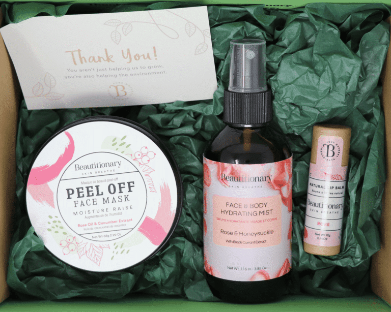 A Mask Set gift box containing a peel off face mask, hydrating face and body mist, and vegan lip balm.