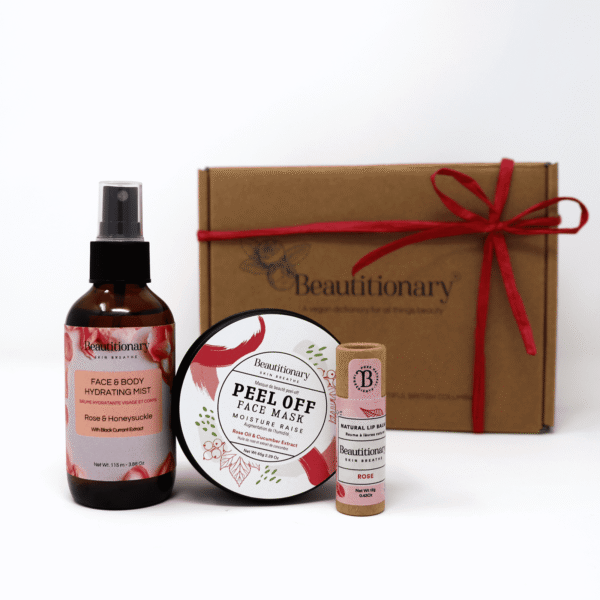 A Mask Set gift box containing a peel off face mask, hydrating face and body mist, and vegan lip balm.
