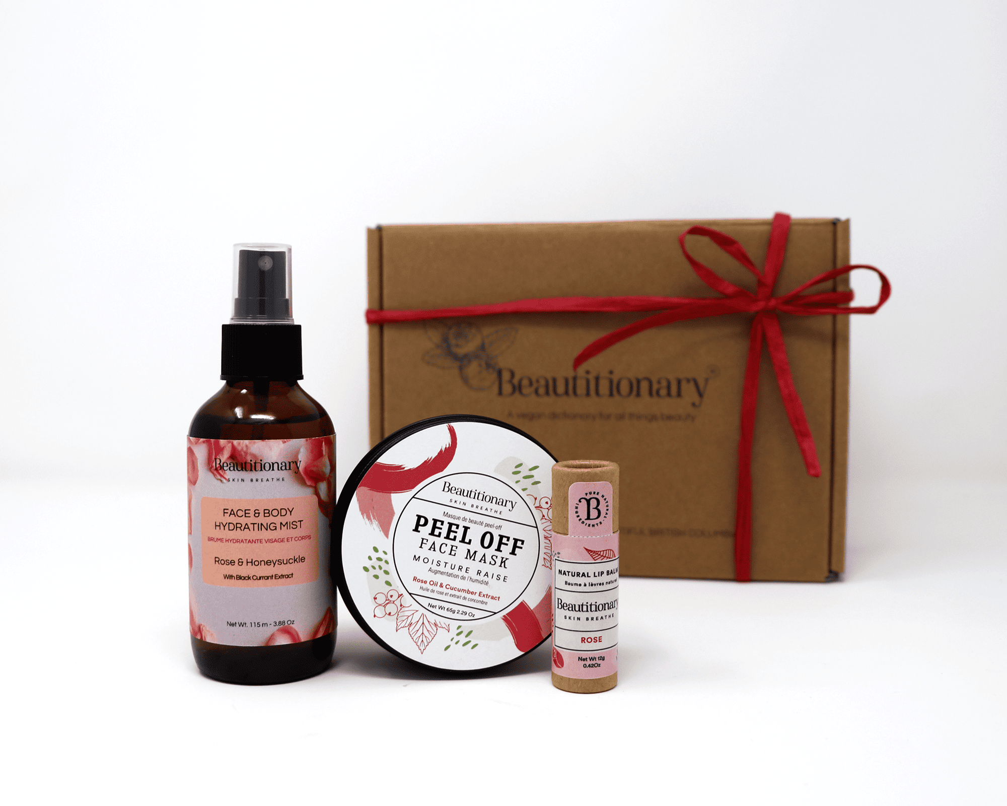 A Mask Set gift box containing a peel off face mask, hydrating face and body mist, and vegan lip balm.