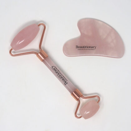 Beautitionary rose quartz face roller and gua sha set.